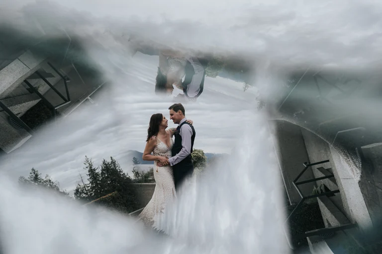 Artistic double-exposure portrait of a wedding couple