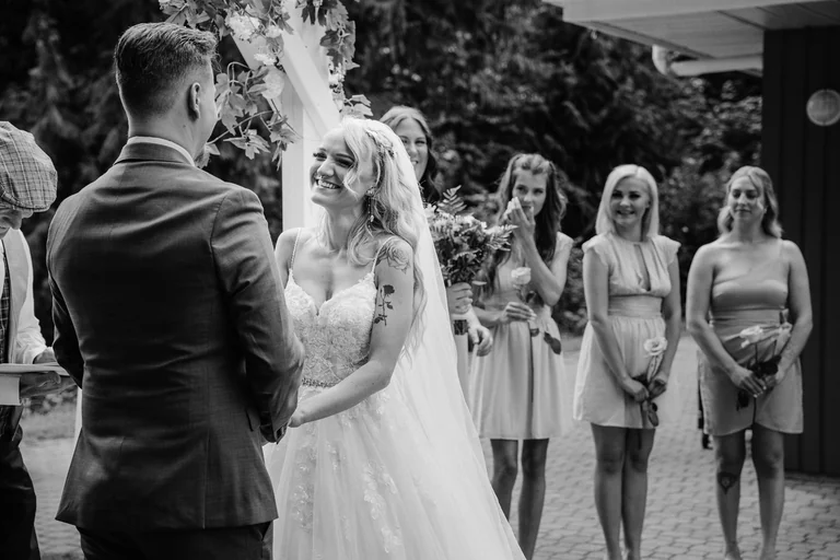Black-and-white photograph of an outdoor wedding ceremony