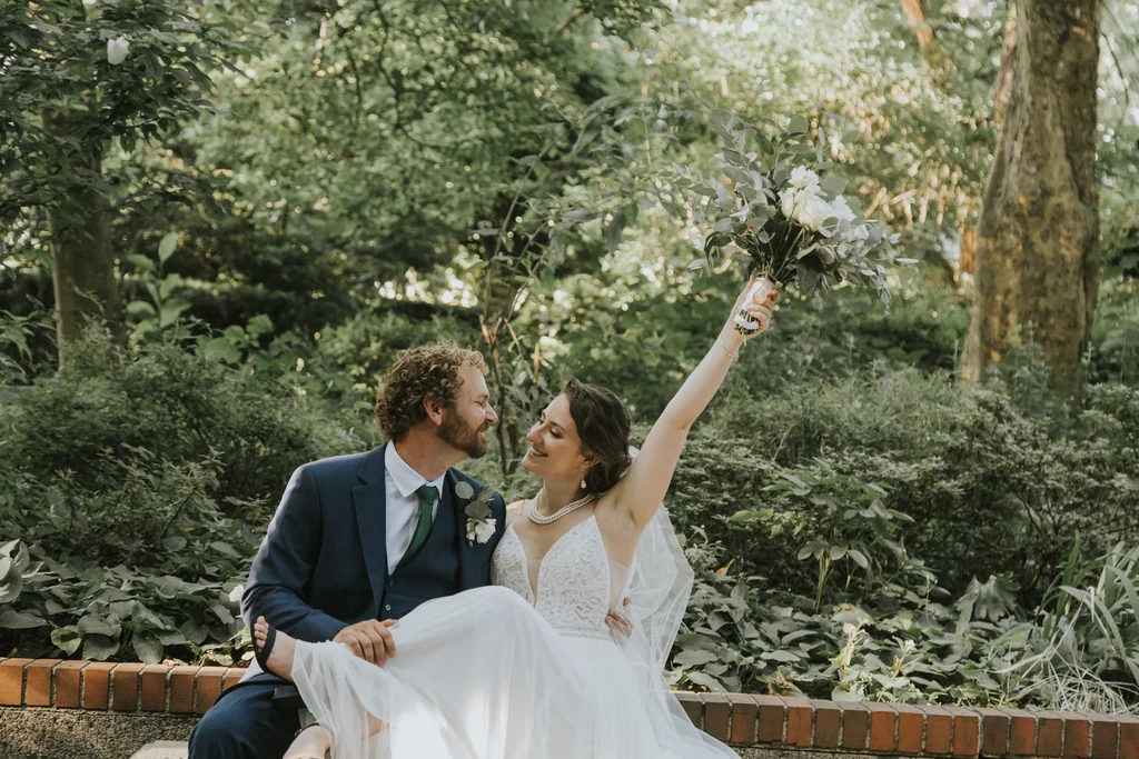 Bride and groom celebrating with confetti
