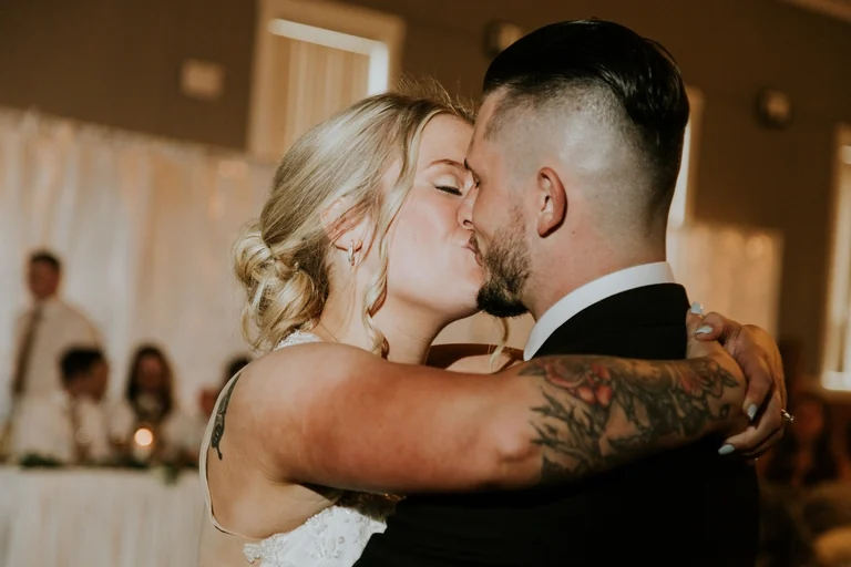 Bride and groom embracing during their first dance