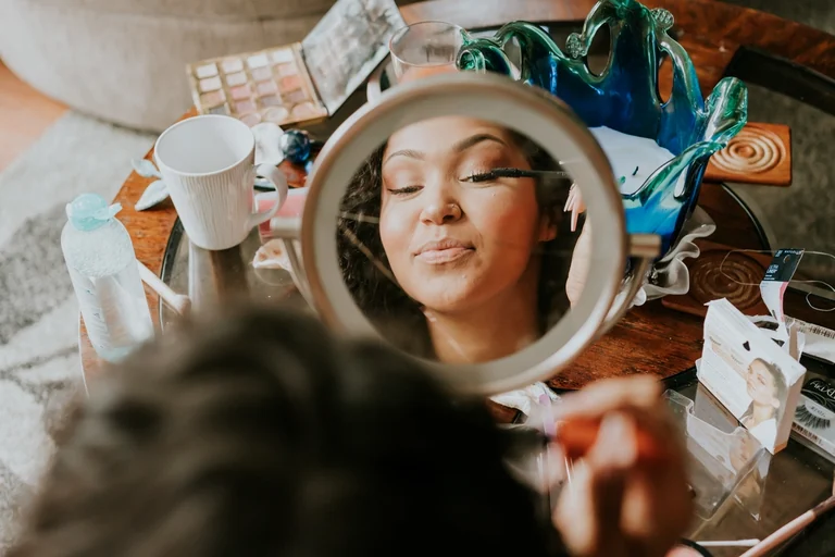 Bride resting while her hair is styled