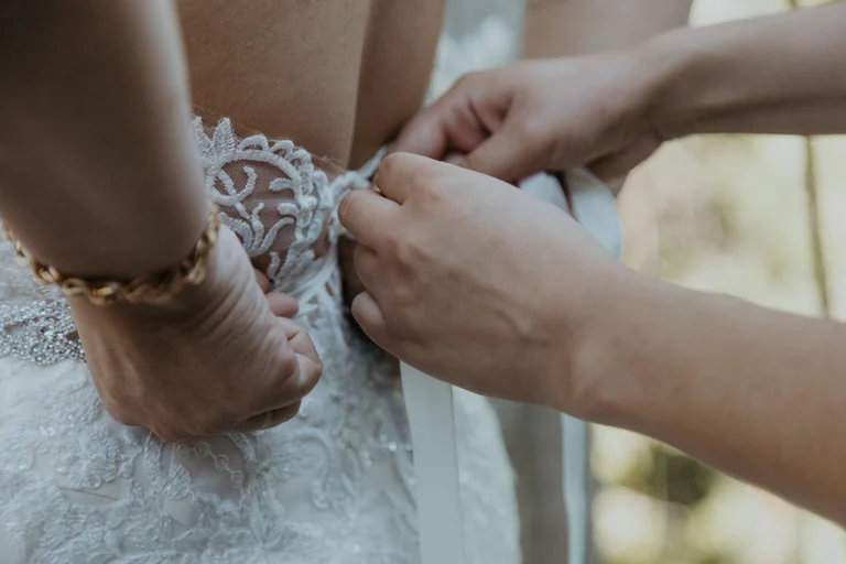 Close-up of pearl details on a wedding dress