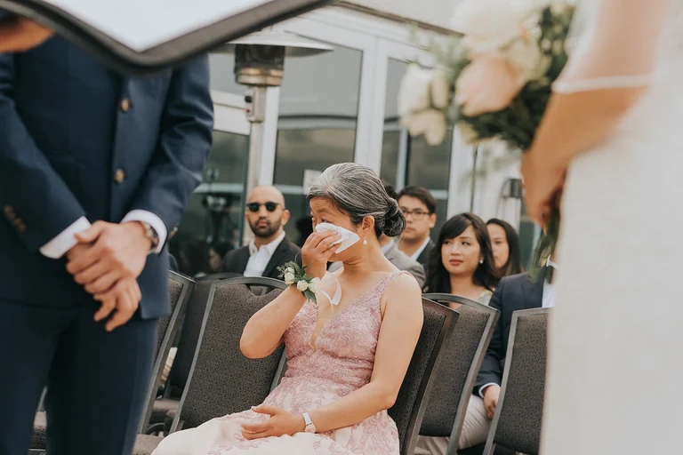 Family members seated during the ceremony