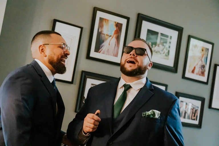 Groom and friends celebrating before the wedding